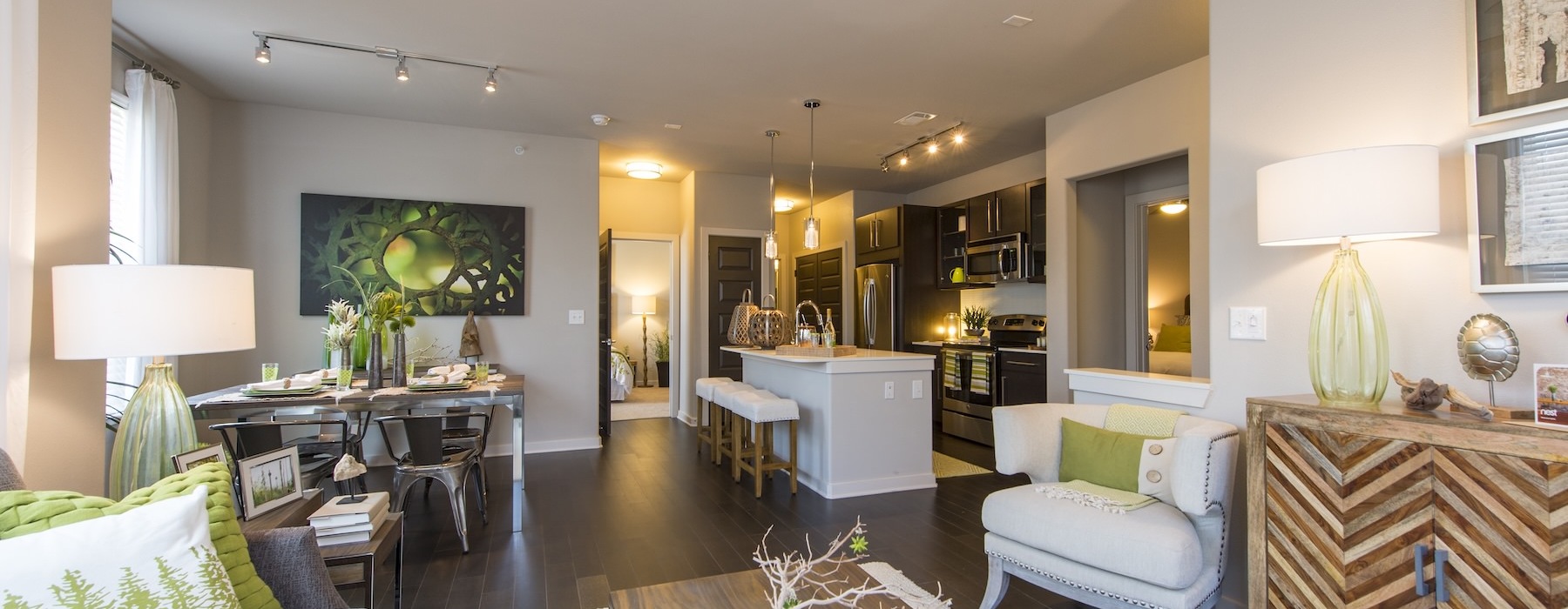 living room with view of a dining room and a kitchen